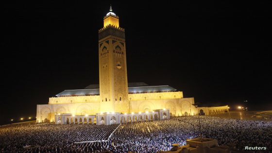 The faithful pray on the esplanade of the Hassan II Mosque on Laylat al-Qadr during the holy month of Ramadan, in Casablanca early August 5, 2013. Laylat al-Qadr (Night of Decree) is the anniversary of the night Muslims believe the Koran was revealed to Prophet Mohammad by the angel Gabriel. REUTERS/Stringer (MOROCCO - Tags: RELIGION SOCIETY ANNIVERSARY)